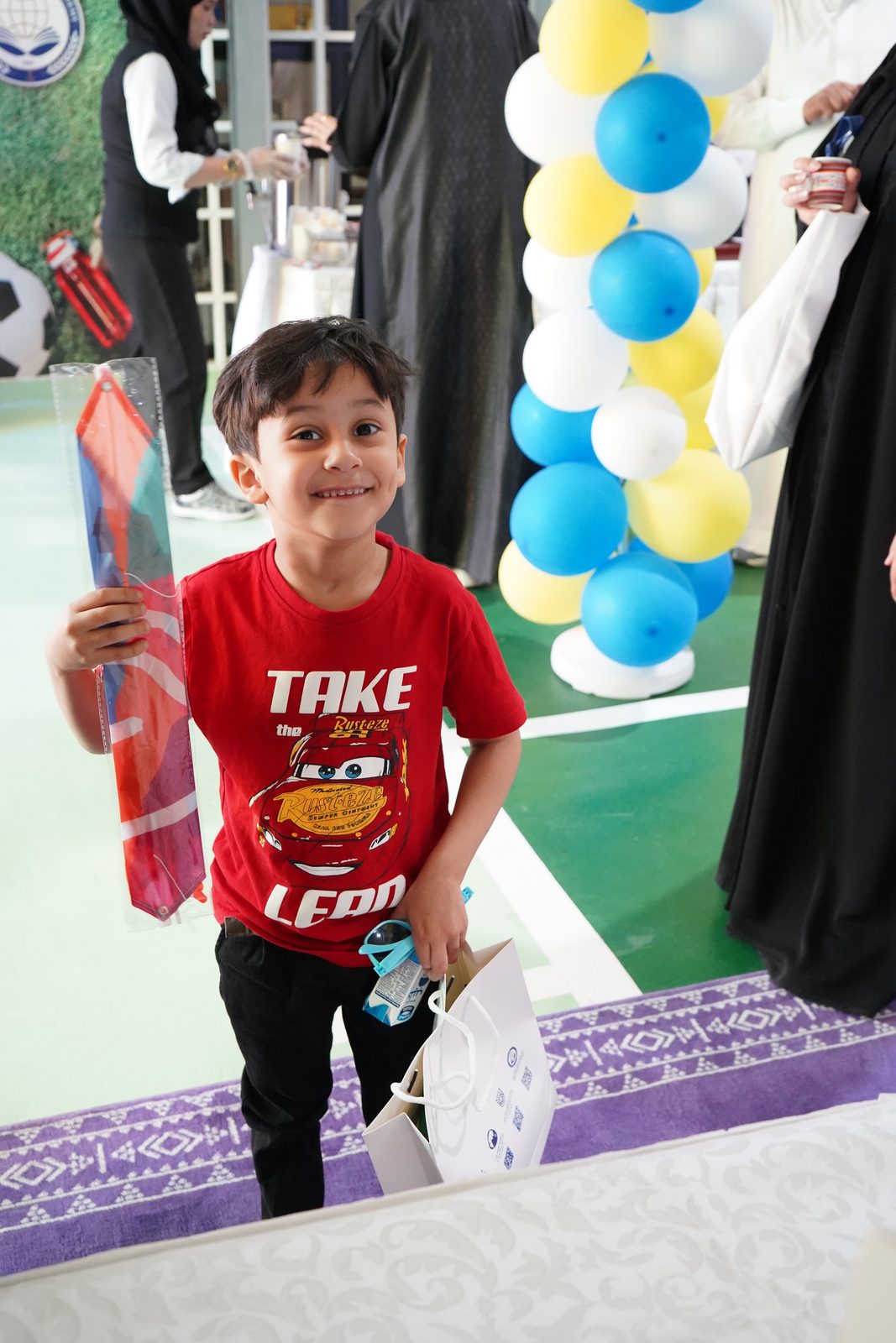 Student holding his welcome gift