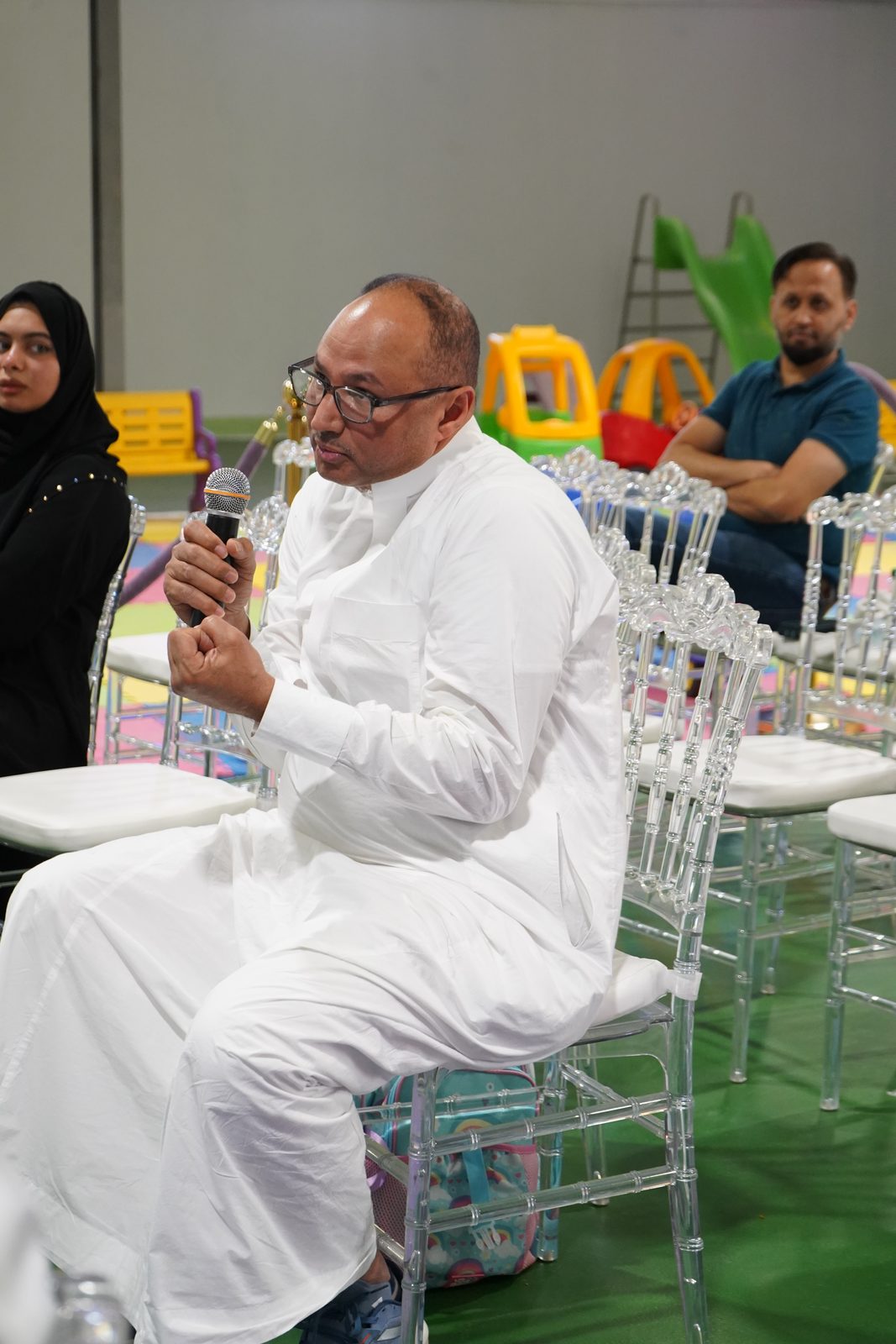 Parent asking a question during the open discussion